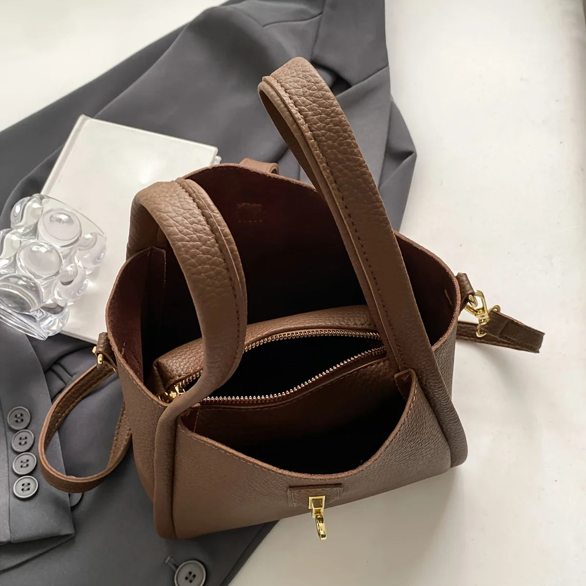 NNEOBA women's multifunctional crossbody handbag with adjustable strap and multiple compartments, stylish and practical for daily use.