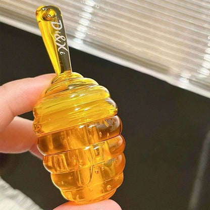Blushimmer organic beeswax honey lip balm in a jar, showing creamy, hydrating lip butter for dry, chapped lips.