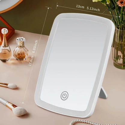 Blushimmer LED makeup mirror with stand, foldable compact square design, touch screen, portable vanity mirror for travel and tabletop use