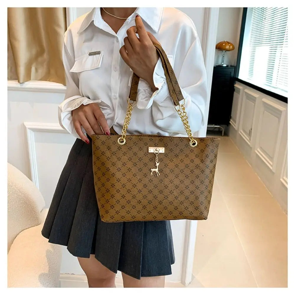 Women luxury tote bag with large capacity, printed shoulder design, stylish handbag perfect for shopping and daily use.