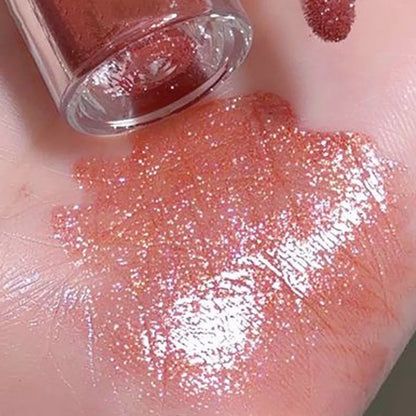 Blushimmer sweet sparkling lip glaze with transparent water gloss finish and light shimmer shine, perfect for a glossy, radiant look.