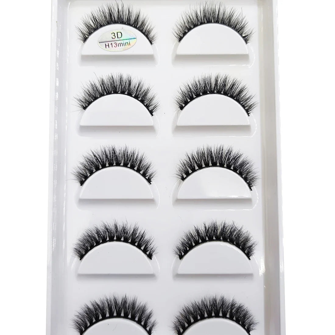 Set of five natural 3D mink false eyelashes by Blushimmer, featuring dramatic cat-eye style for makeup and beauty looks.