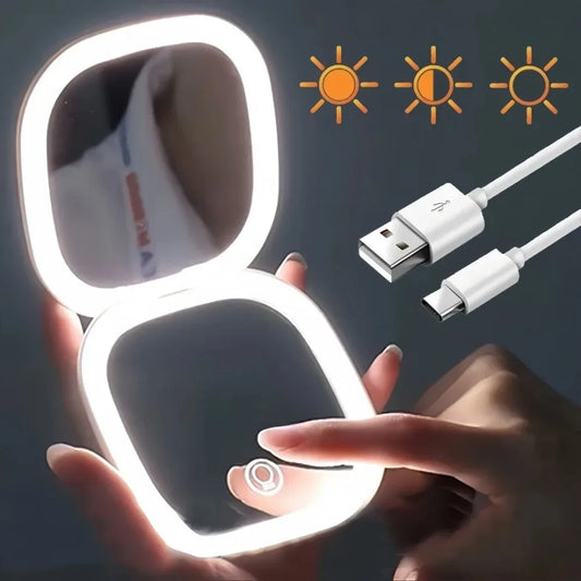 Blushimmer portable LED travel makeup mirror with double-sided design, 2X magnification, folding, and three-level dimming.