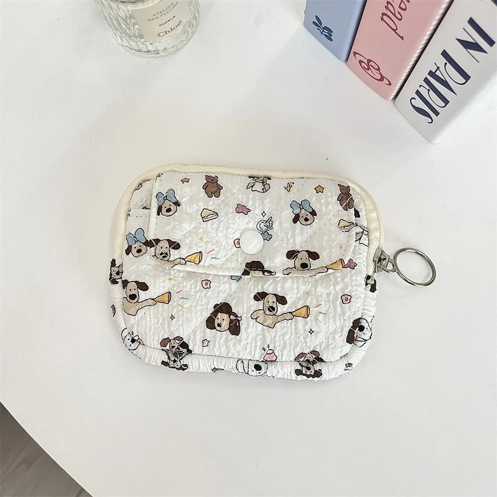 Blushimmer cute cartoon small travel cosmetic bag with lipstick, earphone, and card storage, ideal for makeup and accessories.