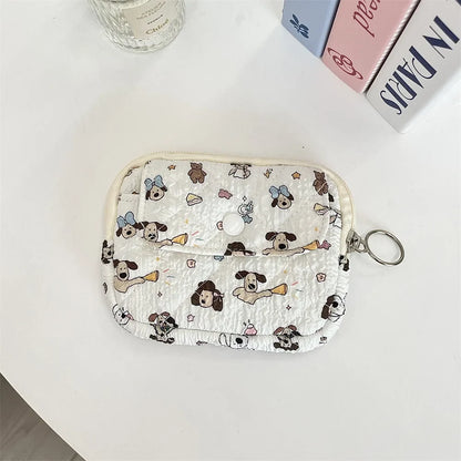Blushimmer cute cartoon small travel cosmetic bag with lipstick, earphone, and card storage, ideal for makeup and accessories.