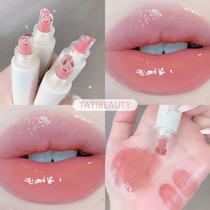 Blushimmer Tatibeauty Lip Jelly Essence Tender Pink hydrating lip gloss with a glossy finish, displayed in a sleek tube.