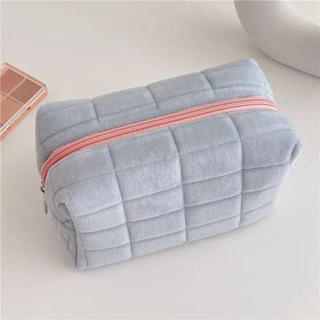 Large Blushimmer solid fur cosmetic storage bag with zipper, ideal for makeup, toiletries, and stationery organization.