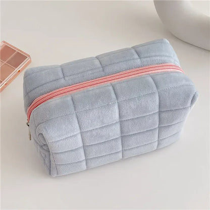 Large Blushimmer solid fur cosmetic storage bag with zipper, ideal for makeup, toiletries, and stationery organization.