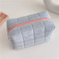 Large Blushimmer solid fur cosmetic storage bag with zipper, ideal for makeup, toiletries, and stationery organization.