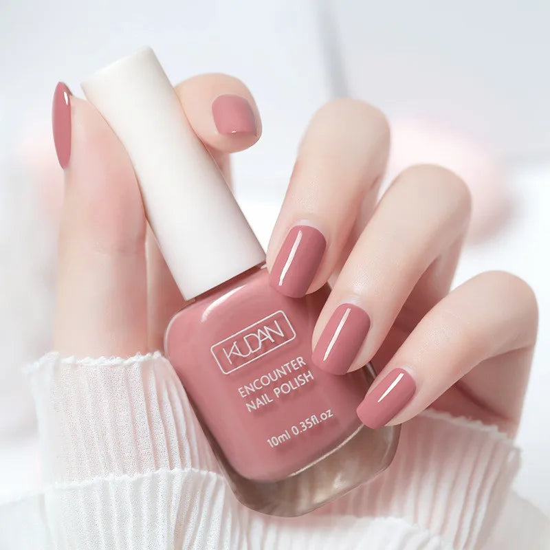 Blushimmer 10ml water-based semi-permanent nail polish bottle with colorful shades for quick-drying, long-lasting manicure.
