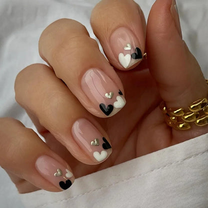 Set of 24 Blushimmer short square fake nails with halo dyed gradient heart and colorful French design on a white background