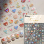 Colorful Cat's Eye 5D Gradient European Love Heart gem nail art stickers with wing and geometric designs for manicure decoration.