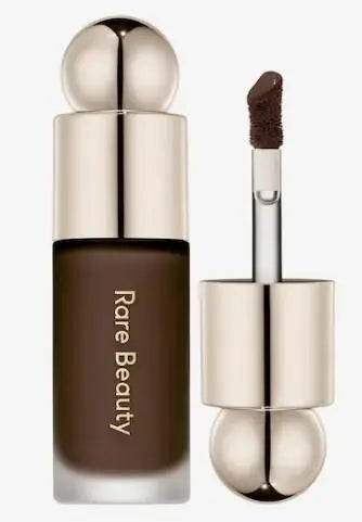 Blushimmer Rare Beauty bronzer stick for face contour, creamy blendable formula, natural sun-kissed glow, and face sculpting.