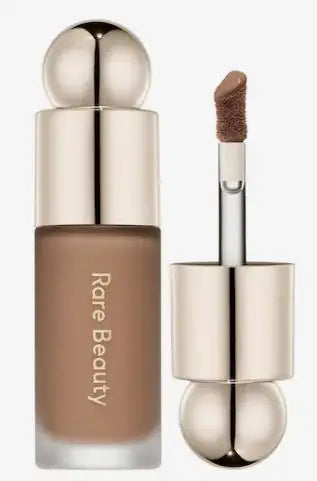 Blushimmer Rare Beauty bronzer stick with creamy, blendable formula for natural sun-kissed glow and face sculpting contouring.