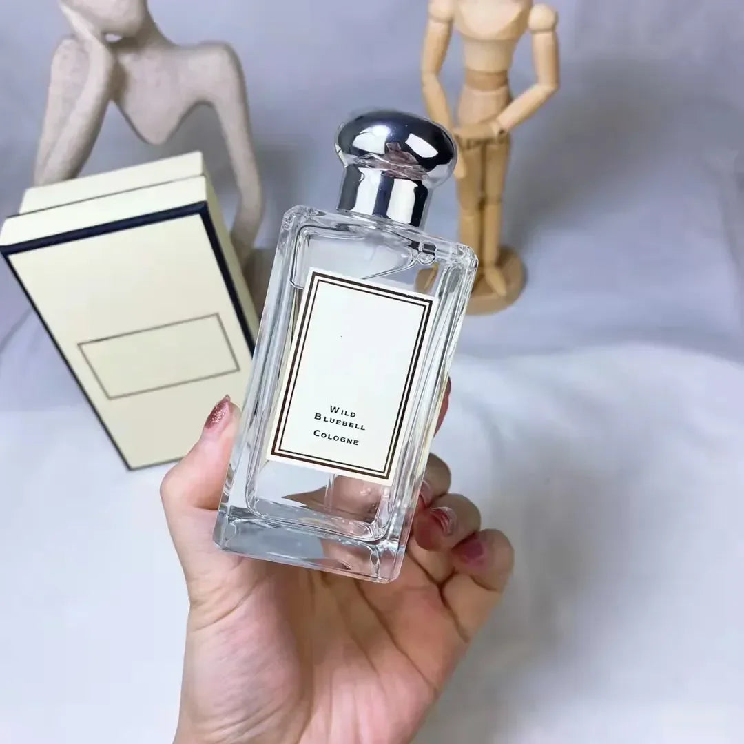 Blushimmer Daily Hot Perfume for Women and Unisex, 100ml natural spray with long-lasting blossom fragrance, shown in sleek bottle.