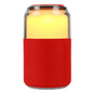 SuperSonic SobaBoom multicolor glowing speaker with red LED lights, portable home stereo system with vibrant lighting effects.