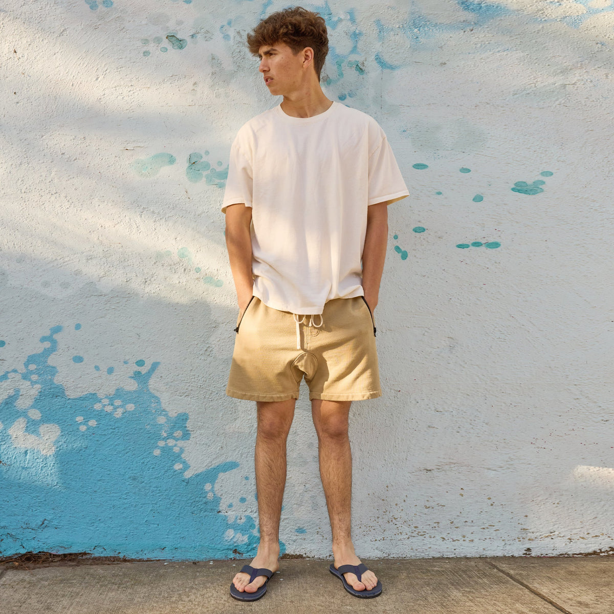 Fleks Seagrove Flip Flop in deep blue sea color, casual footwear with comfortable straps, shown in a lifestyle setting.