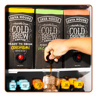 Cold brew coffee on tap from Java House, served in a clear glass with ice, showcasing a rich, dark coffee beverage.