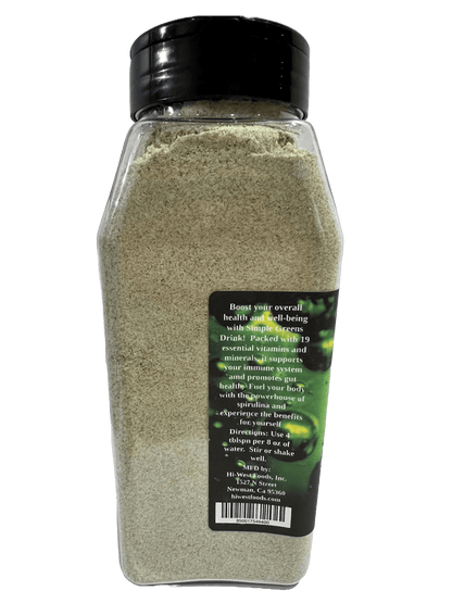 Hi-West Simple Greens drink mix in a green powder container, with fresh green vegetables and ingredients displayed around it.