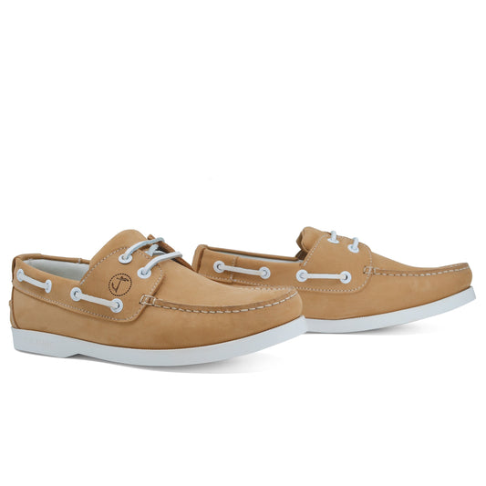 Seajure Women’s Noordhoek boat shoe in tan leather with white rubber sole, stylish slip-on footwear for casual wear.