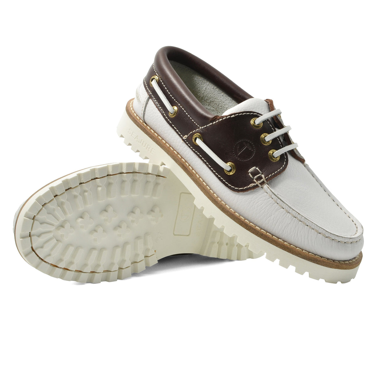 Seajure Women’s Izola boat shoes with beige leather uppers and white rubber soles, casual slip-on footwear for women.