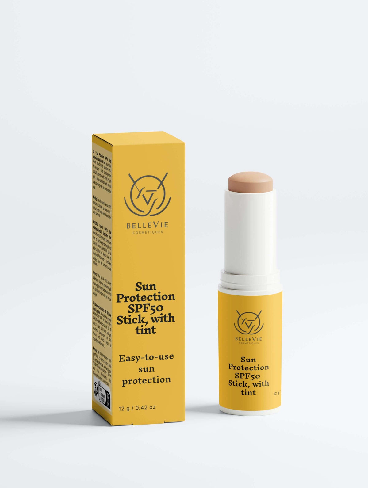 Tinted SPF50 mineral sunscreen stick by BelleVie Cosmétiques with zinc oxide and titanium dioxide, showing the compact tube and applicator.