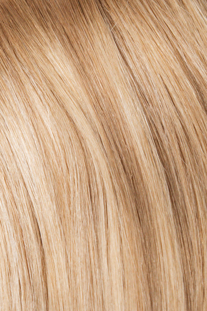 Rachel Paige XO Luxury Signature Weft Collection hair extensions in a sunray blonde shade, displayed in a natural close-up shot.