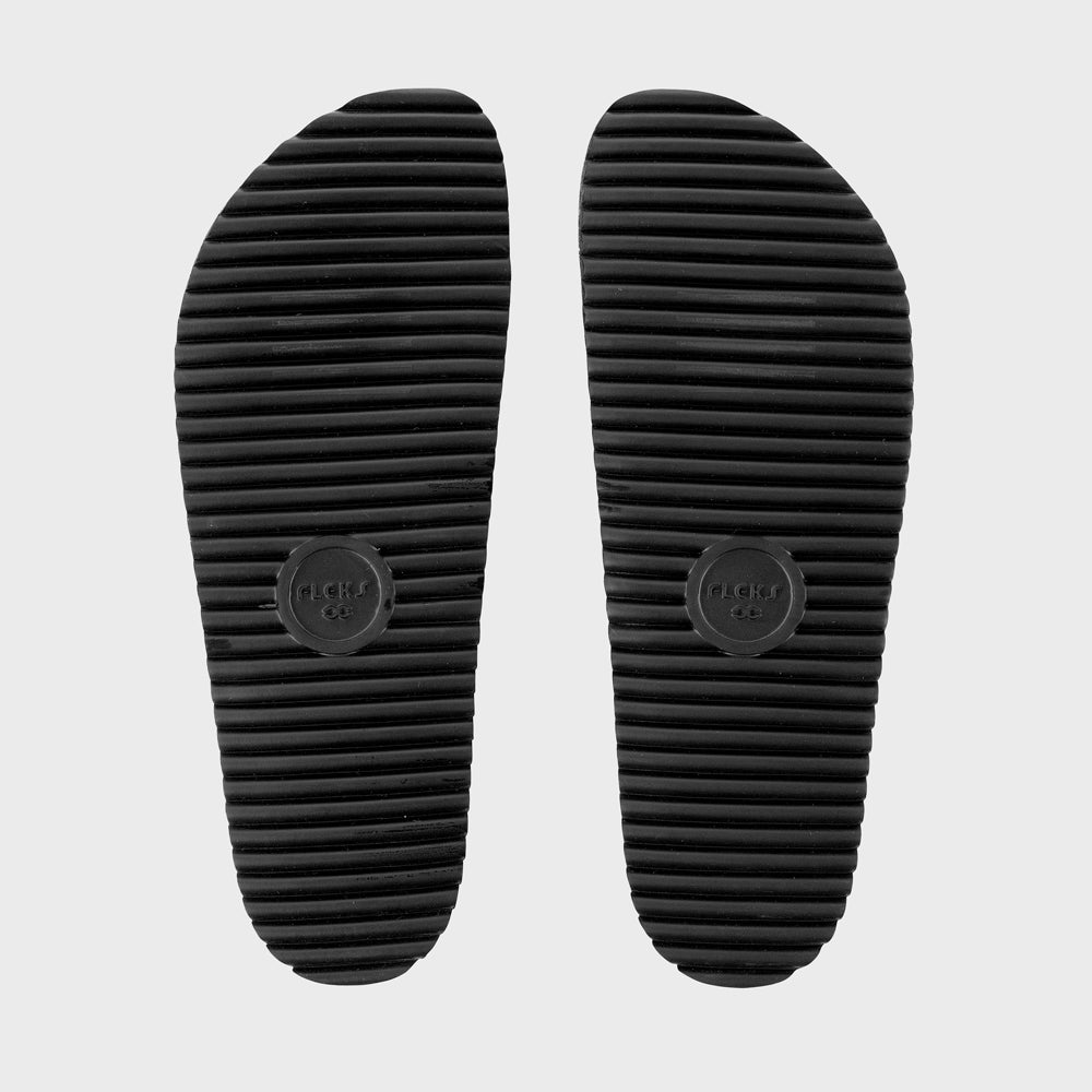 Fleks San Ysidro Slide in fig color showing the slide's textured outsole and comfortable strap design.