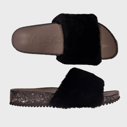 Fleks San Ysidro Slide in Raven color, featuring a sleek design with cushioned straps and a durable sole.