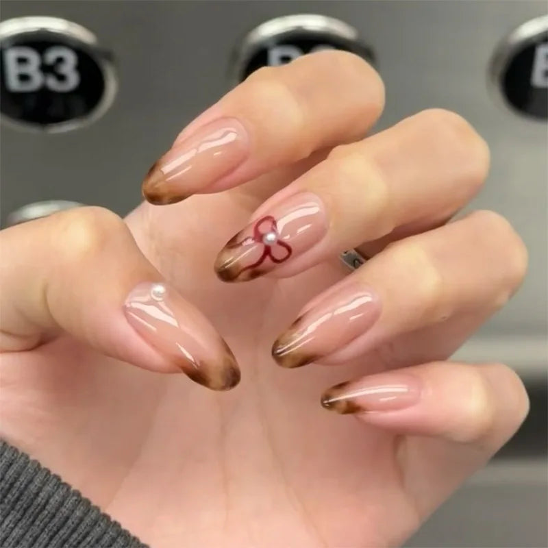 Blushimmer 3D bowknot pearl leopard French nude almond fake nails with detachable press-on design, stylish and elegant nail art.