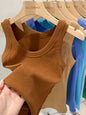 Zjaiss women's solid ribbed round neck tank top, elastic summer camisole with O-neck design, lightweight and basic style.