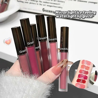 Blushimmer Berry Red Mirror Translucent Lip Gloss showing a clear, water-light, moisturizing lipstick with a nude brown tint and glossy finish.