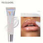 Blushimmer glitter lip gloss tube with transparent moisturizing fruit lip oil, adding shine and fullness to lips.