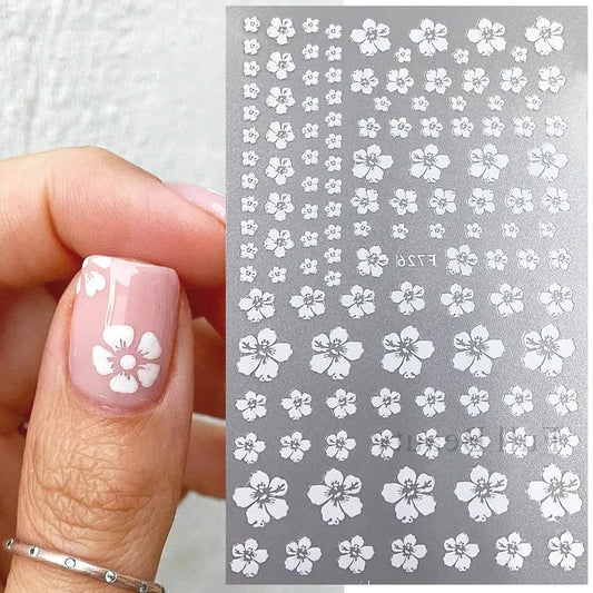 White cherry blossom 3D nail stickers with flower petals for elegant spring wedding nail art and Sakura manicure design by Blushimmer.