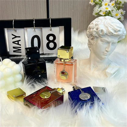 Blushimmer ARMAF EDP 30ml unisex perfume bottle with elegant design, showcasing a luxurious, sweet floral scent for women and men.