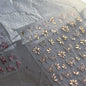Close-up of Blushimmer Jelly Butterfly 5D nail art sticker with rhinestones and shiny insect design for DIY manicure decoration.