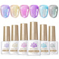 Six bottles of Blushimmer Born Pretty crystal amber gel nail polish set in jelly pink and nude shades for winter manicures.