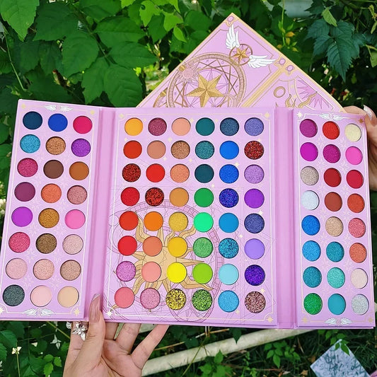 Colorful Blushimmer Christmas 96-color eyeshadow palette with shimmer, matte, and sequin shades for vibrant makeup looks.