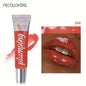 Blushimmer glitter lip gloss tube with moisturizing fruit lip oil, transparent tint, soft applicator for full, glossy lips.