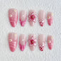 Set of 10 French almond press-on nails with flower design by Blushimmer, wearable false nails for easy application and natural look.