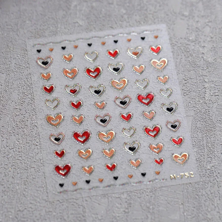 Colorful Cat's Eye 5D gradient European love heart gem nail art stickers with geometric wing designs for manicure decoration.