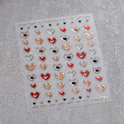Colorful Cat's Eye 5D gradient European love heart gem nail art stickers with geometric wing designs for manicure decoration.