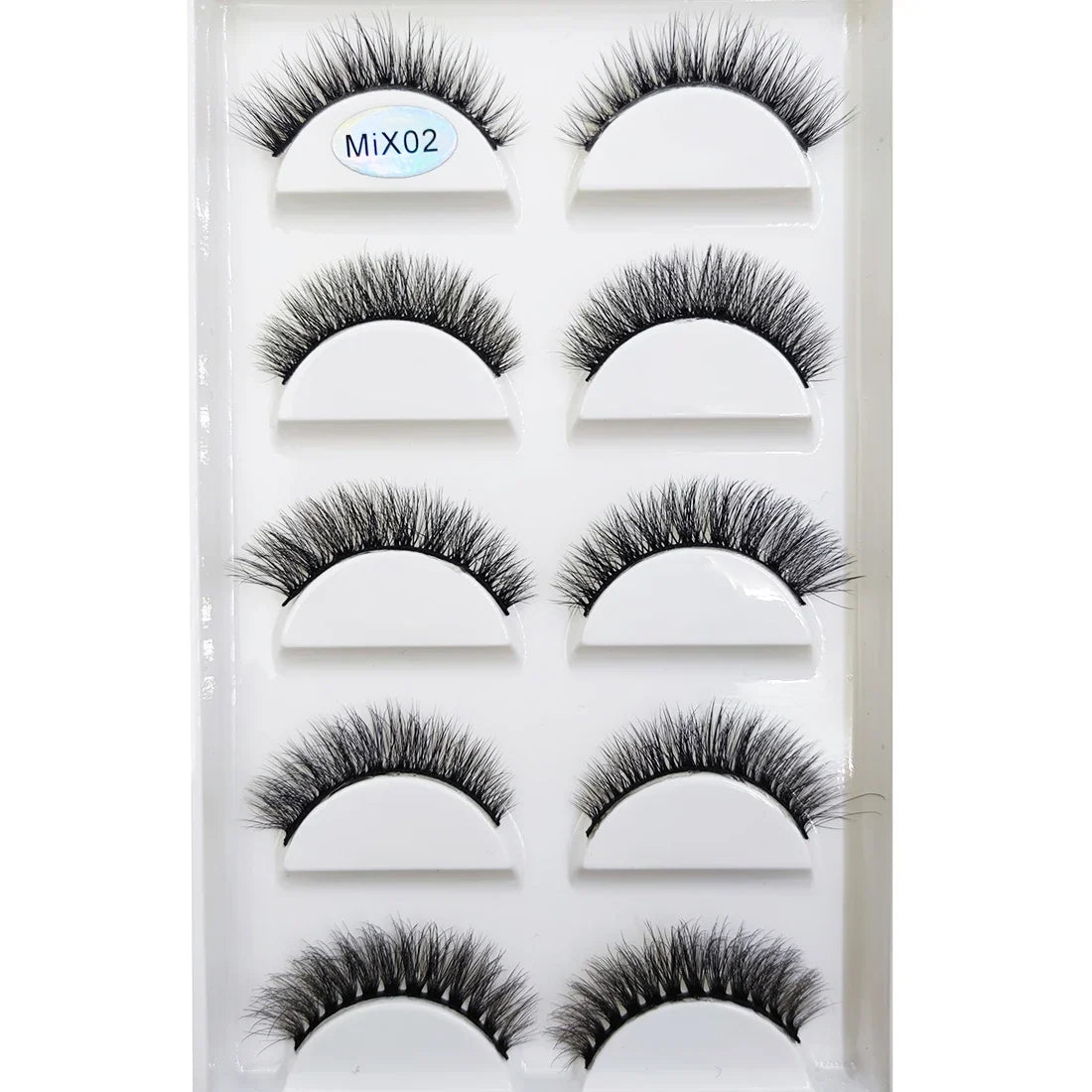 Pair of natural 3D mink false eyelashes by Blushimmer, featuring a full, fluffy style for a dramatic eye makeup look.