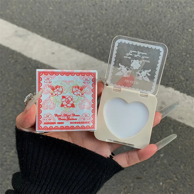 Blushimmer Cupid Eros unisex solid perfume featuring fresh floral, fruity scents with strawberry, gardenia, and apple notes.