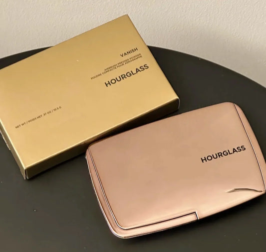 Blushimmer Hourglass Vanish Airbrush Press Powder in Light Mist, translucent oil control setting powder for a matte finish.