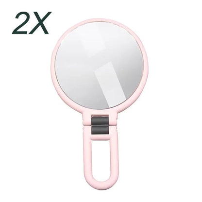 Blushimmer magnifying makeup pocket mirror with 2x, 5x, 10x, or 15x zoom, small folding design for women’s beauty use.