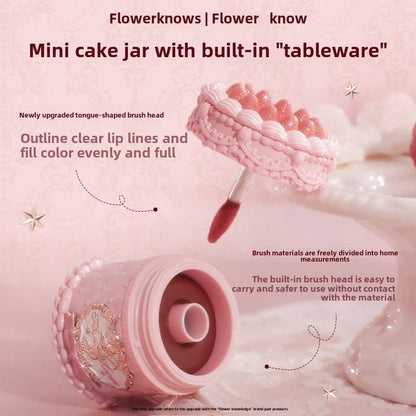 Blushimmer Flowerknows Strawberry Cupid lipstick cake with matte velvet finish and lip gloss, featuring pink and red floral packaging.