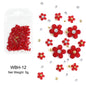 White acrylic flower nail art decorations with mixed size red and blue rhinestones for DIY manicure designs.