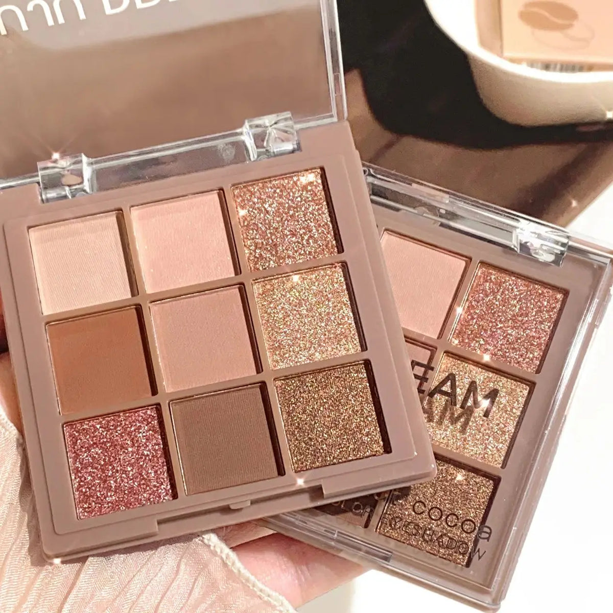 Blushimmer 9-18 color eyeshadow palette with velvet matte and shimmer shades in berry, brown, and nude tones.