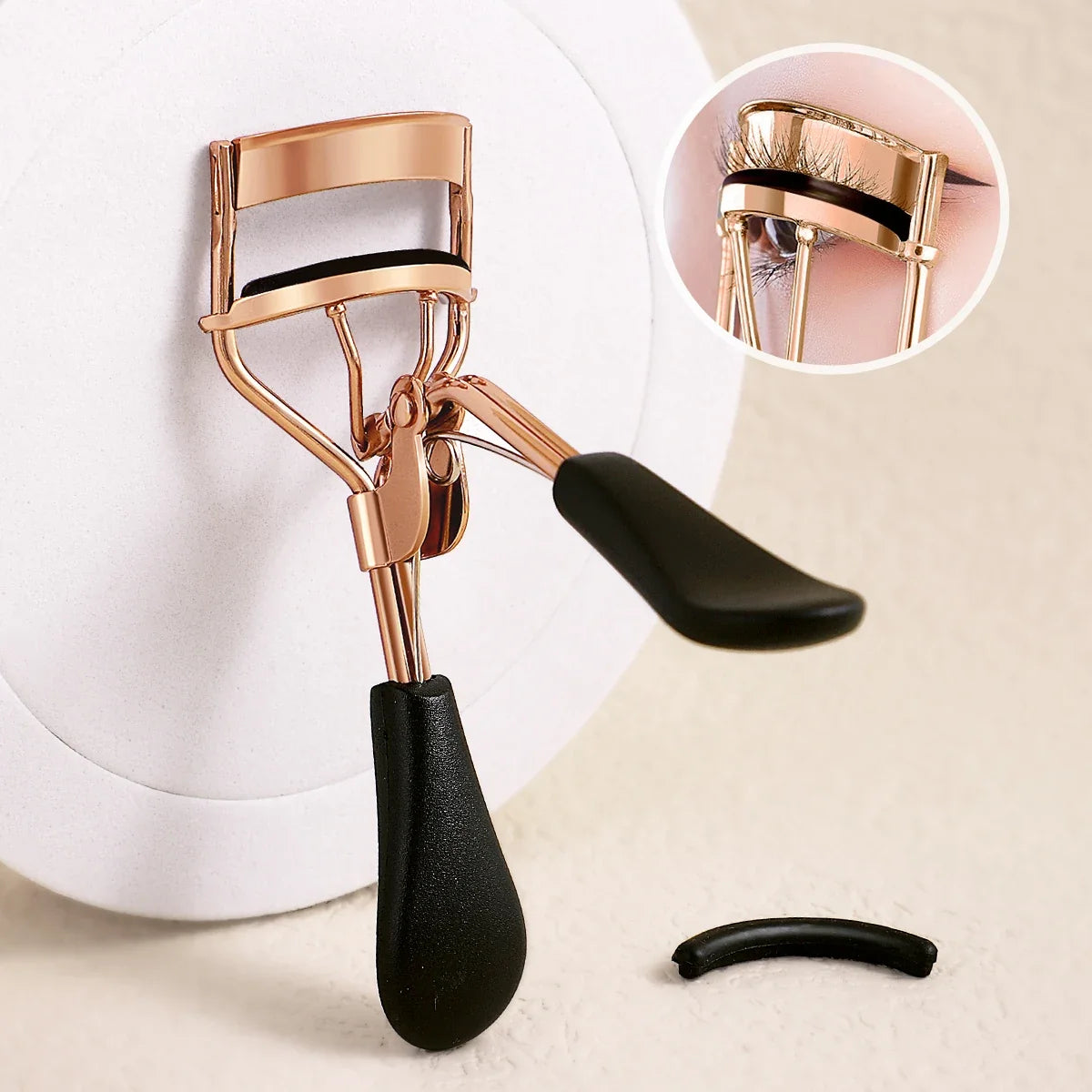 Blushimmer portable eyelash curler with stainless steel body and 15 silicone pads for eyelash extension and curling.